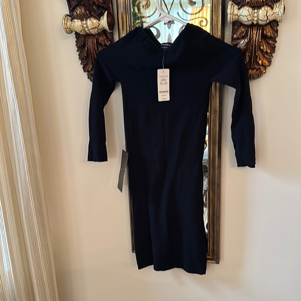 NWT Bebe black dress classic. Sz p/s. Long sleeve. Stretchy